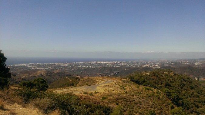 view of the coast from the Sierra de Las Nieves biosphere