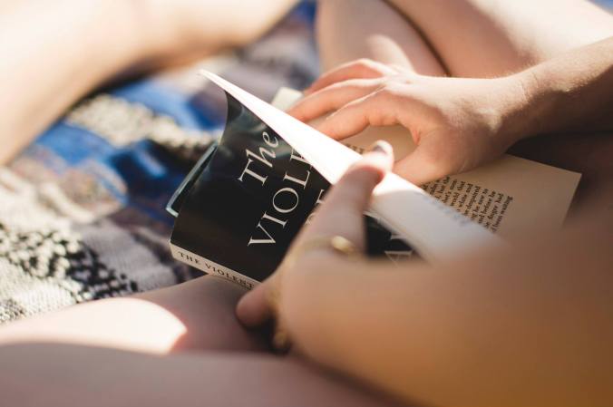 Book and hands closeup